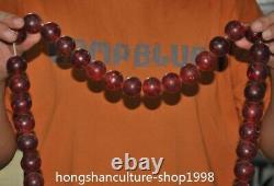 26.8 Chinese Man-made amber Carved Buddha beads Exorcism amulet necklace
