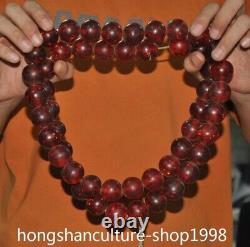 26.8 Chinese Man-made amber Carved Buddha beads Exorcism amulet necklace