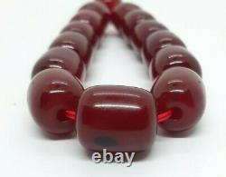 63.1 Grams Antique Cherry Amber Bakelite Beads Damari/Veins