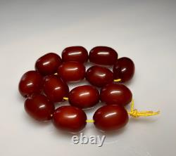 67 Grams Antique Faturan Cherry Amber Bakelite Beads Marbled