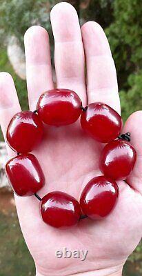 83.1 Grams Antique Faturan Cherry Amber 7 Big Beads Veins/Damari