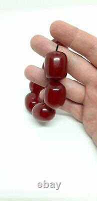83.1 Grams Antique Faturan Cherry Amber 7 Big Beads Veins/Damari
