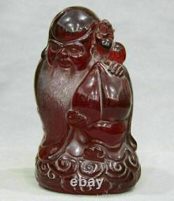9 Chinese Red Amber Carving Feng Shui God of longevity Hold Peach Sculpture