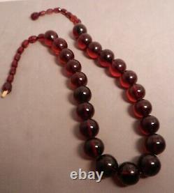 ANTIQUE CHERRY AMBER BAKELITE BEADS NECKLACE, 64gr, 21L, 16mm BEAD SIZE, CLEAR