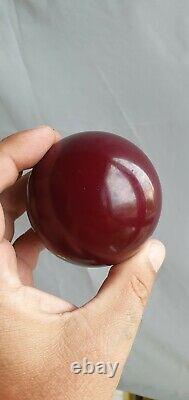 Antique Art Deco Cherry opaque color Bakelite ball