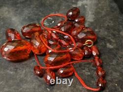 Antique Bakelite Graduating Faceted Cherry Amber bead loose need restring 22g