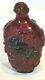 Antique Chinese Dip Red -cherry Bakelite Amber Snuff Bottle With Carved Buddha