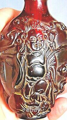 Antique Chinese Dip Red -cherry Bakelite Amber Snuff Bottle With Carved Buddha