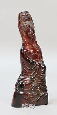 Antique Dark Cherry Amber Carved Guanyin Figure