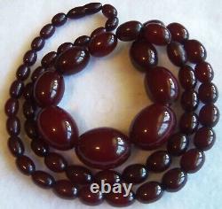 Antique Long Bakelite Dark Cherry Amber Graduated Bead Necklace excellent 76.6 g