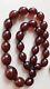 Antique Old Cherry Amber Bakelite Beads, 96 Grams
