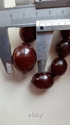 Antique Old CHERRY amber Bakelite BEADS, 96 grams