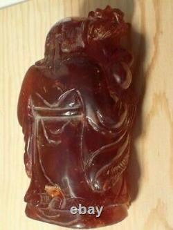Antique Red Cherry Amber Carving of the Chinese Deity of Longevity (SHOU)