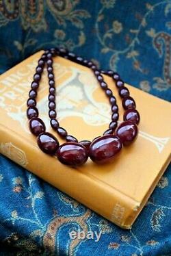 Antique graduated Cherry Amber necklace early 1900's 68.039 grams 30 inch long
