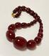 Cherry Amber Bakelite Marbled Faturan Oval Beads Necklace 38.3 Gms Prayer Worry