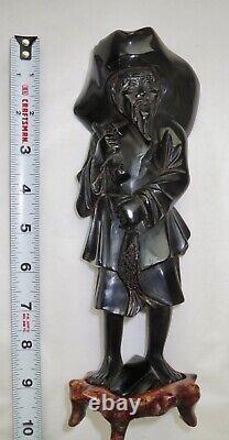 Chinese Cherry Amber Bakelite Figure Man With A Fish