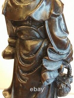 Fine Chinese Cherry red Carved wood Figure of man carry Buddha basket staff