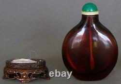 Rare 18th century Chinese Red-amber Crizzled Glass Snuff Bottle with wood stand