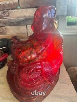 Red amber happiness buddha Large 12 h x 9w filled with grains and amulet etc