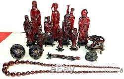 Set Of 15 Figures And 1 Collar. Chinese Red Amber. China. XIX Century