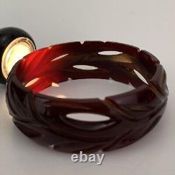 VTG Bakelite Bracelet Cherry Amber Pierced Deeply Carved Tiki Hawaiian Wine Red