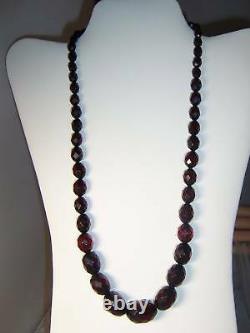 Vintage 24 Inch Long Graduated Faceted Cherry Amber Bakelite Necklace