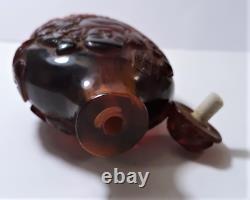 Vintage Chinese Carved Cherry Amber Buddha and Boys Snuff Bottle