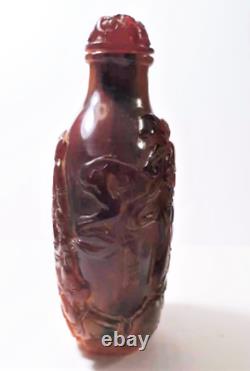 Vintage Chinese Carved Cherry Amber Buddha and Boys Snuff Bottle