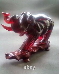 Vintage Chinese finely carved cherry red acrylic Elephant statue 9 inches
