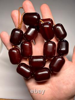 125 grammes de perles en ambre de cerisier Faturan antique en bakélite marbrée