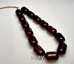 125 grammes de perles en ambre de cerisier Faturan antique en bakélite marbrée