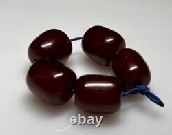 22,6 grammes de perles en ambre de cerisier marbré en bakélite antique