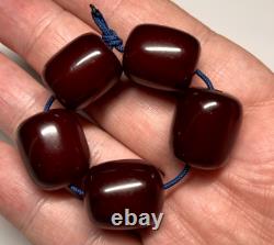 22,6 grammes de perles en ambre de cerisier marbré en bakélite antique