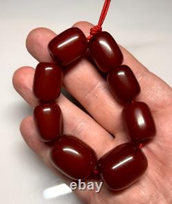 34,2 grammes de perles en ambre de cerisier en bakélite antique marbrée