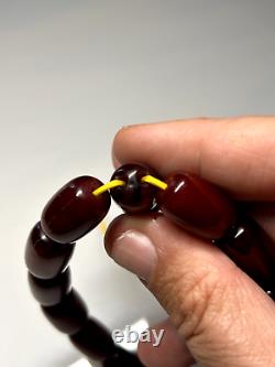 40 Gr Antique Faturan Cherry Amber Bakelite Rosary Prayer Beads Marbled
	<br/>
	
<br/>	Translation: 40 Gr Ancien Faturan Cerise Ambre Bakélite Rosaire Perles de Prière Marbrées