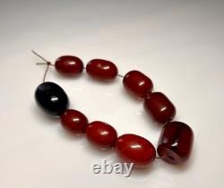 66 Grammes de perles en ambre de cerisier faturan ancien marbré en bakélite