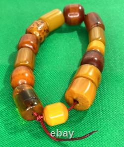 85 grammes de perles de bakélite en ambre cerise Faturan antique, marbrées, faites à la main, en chapelet.