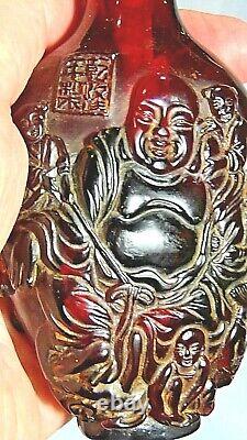 Bouteille à tabac en ambre bakélite rouge - cerise antique chinoise avec Bouddha sculpté