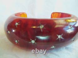 Bracelet de manchette rare en bakélite d'ambre de cerisier Art Déco vintage incrusté de cristaux étoiles