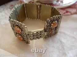 Bracelet en verre d'agate de couleur ambre antique vintage incrusté dans un large bracelet en argent étranger