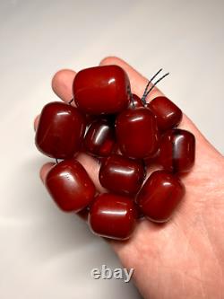 Collier de perles en ambre de cerisier ancien Faturan de 99 grammes marbré en bakélite.