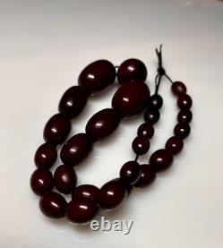 Collier de perles en ambre de cerisier faturan antique de 54 grammes en bakélite marbrée