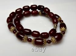 Collier de perles en ambre de cerisier faturan antique de 74,5 grammes avec marbrures en bakélite