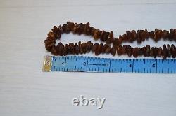 Collier de perles en ambre naturel de la Baltique foncé naturel d'antan pesant 134 grammes
