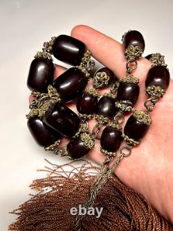 Collier de perles en bakélite d'ambre de cerisier Faturan antique marbré.
