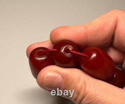 Collier de perles en bakélite d'ambre de cerisier antique de 94 grammes marbré