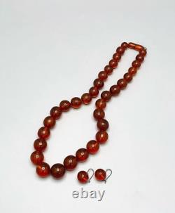 Ensemble de bijoux en argent sterling 875 et ambre de l'URSS Antique comprenant un collier, des perles et des boucles d'oreilles.