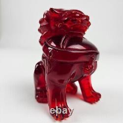 Figurine de chien Foo chinois en ambre rouge naturel sculpté du XIXe siècle