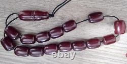 Perles de prière soucis en ambre antique Faturan rouge cerise en bakélite catalin, 15 + 1.
