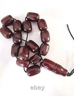 Perles de prière soucis en ambre antique Faturan rouge cerise en bakélite catalin, 15 + 1.